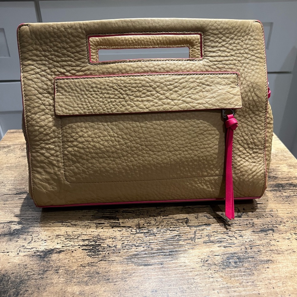 Coach clutch new with tags pink and tan pebble